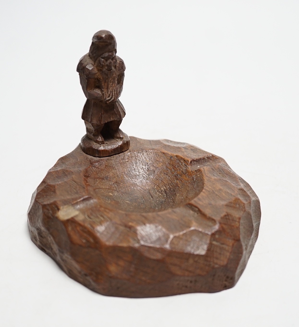 A Thomas ‘The Gnomeman’ Whittaker carved oak ash tray, 11cm tall